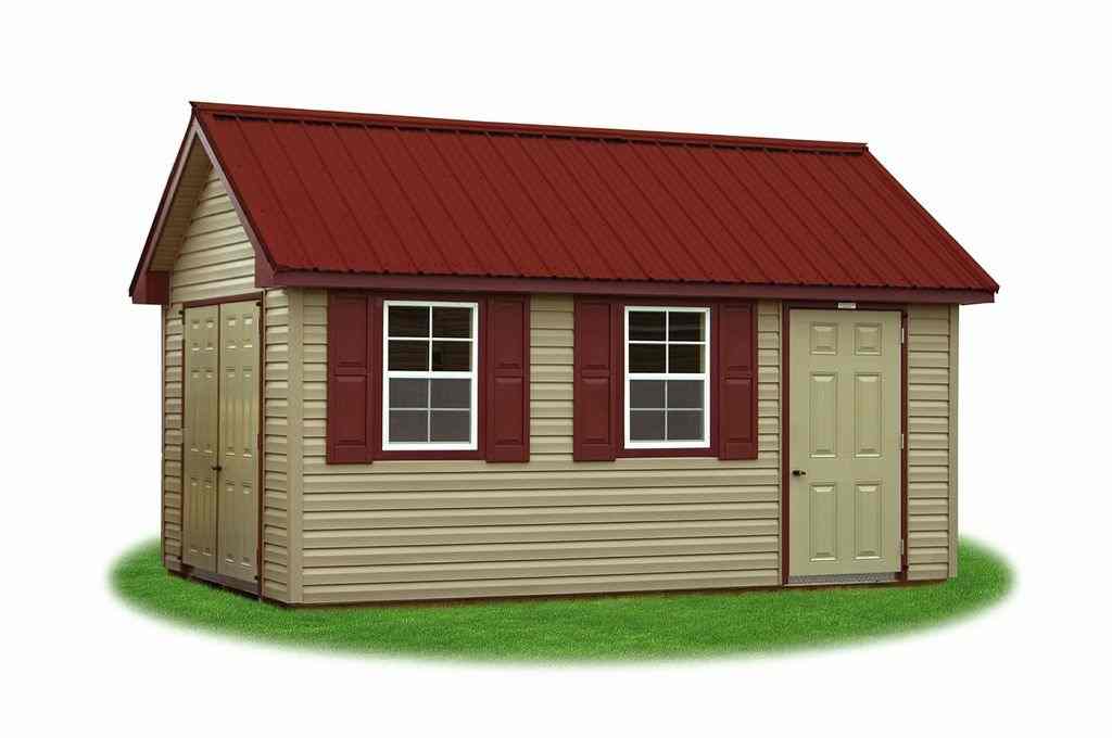 10x16 Cape Cod style storage shed with red metal roof, vinyl siding, and shuttered windows—perfect for backyard storage with curb appeal.